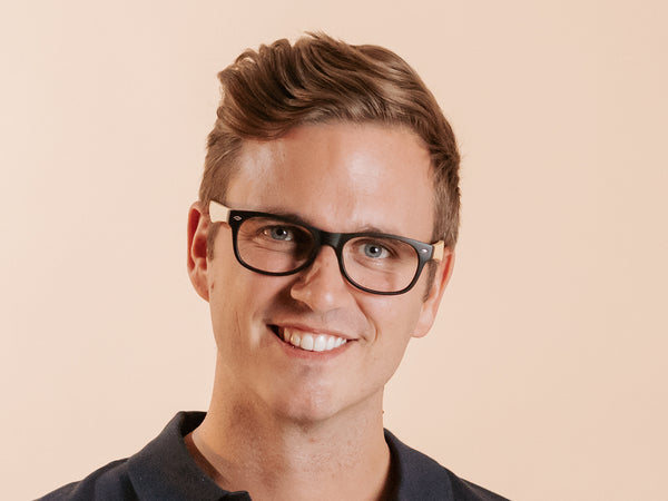 Man wearing Natural Bamboo Readers 'Oakland' Matt Black