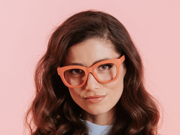 Woman wearing Eco-Wheat Reading Glasses 'Encore' Orange