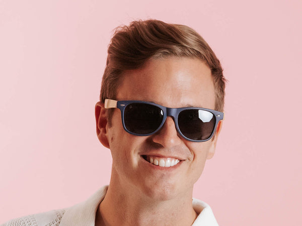 Man wearing Sunglasses Polarised 'Ash' Matt Blue/Bamboo