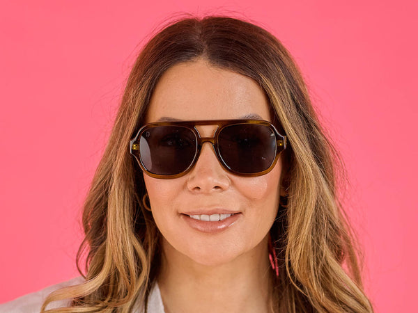 Woman wearing Sunglasses Polarised 'McQueen' Olive